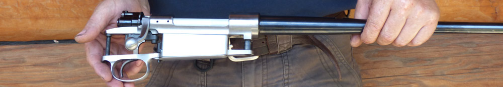 Jan Kolenbrander holding a custom-build action and muzzle